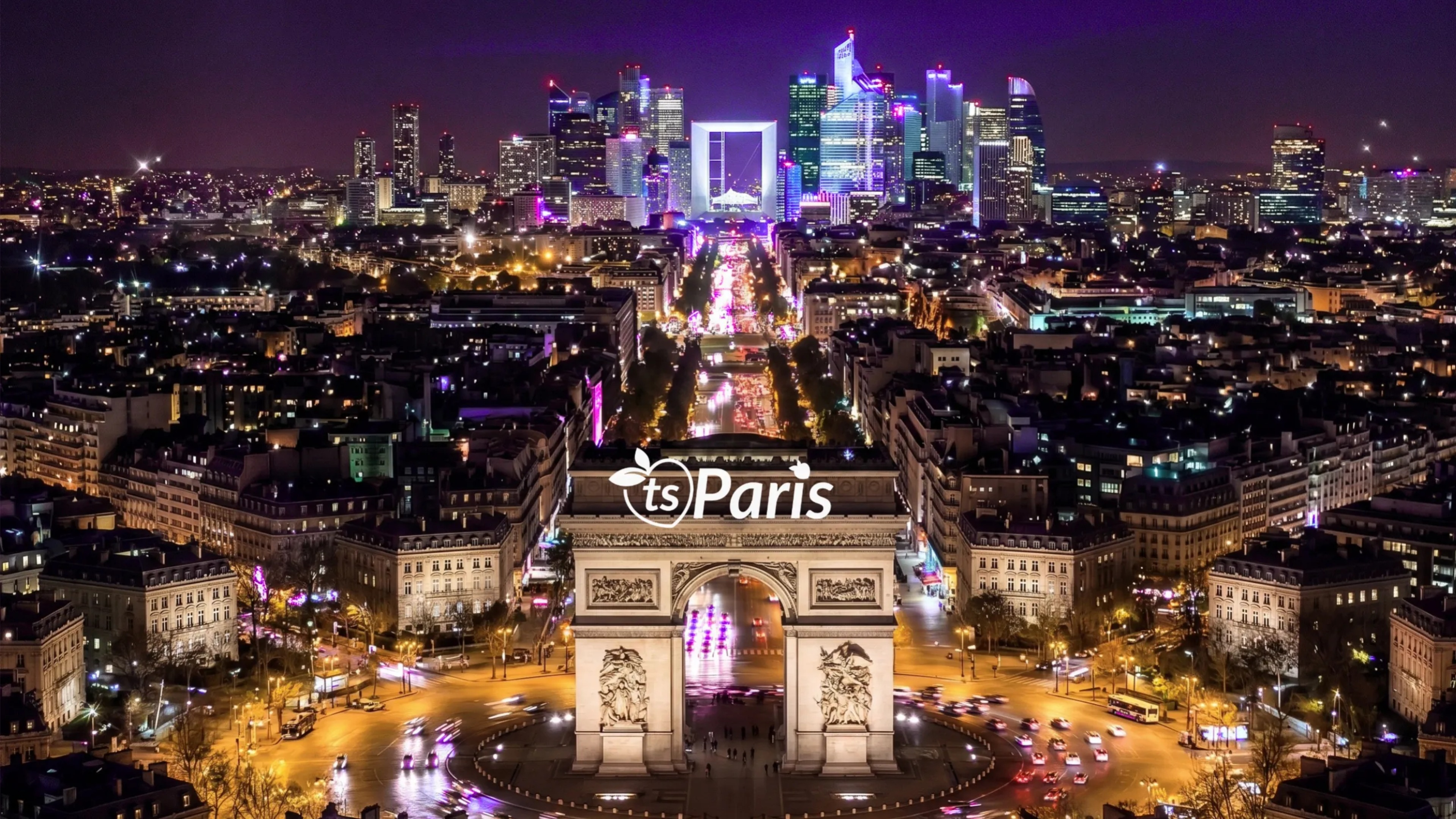 Paris at night from above the Arc de Triomphe, with the ts Paris mark